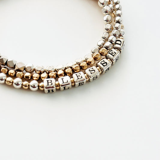 Sterling Silver and 14k Gold beaded gift bracelet spells out the affirmation BLESSED
