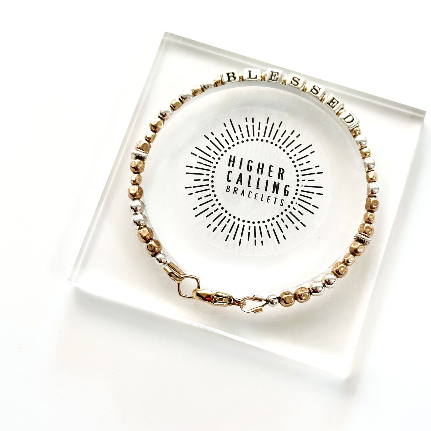 Blessed Engraved Gift Bracelet in gold and silver by Higher Calling Bracelets, shown in packaging