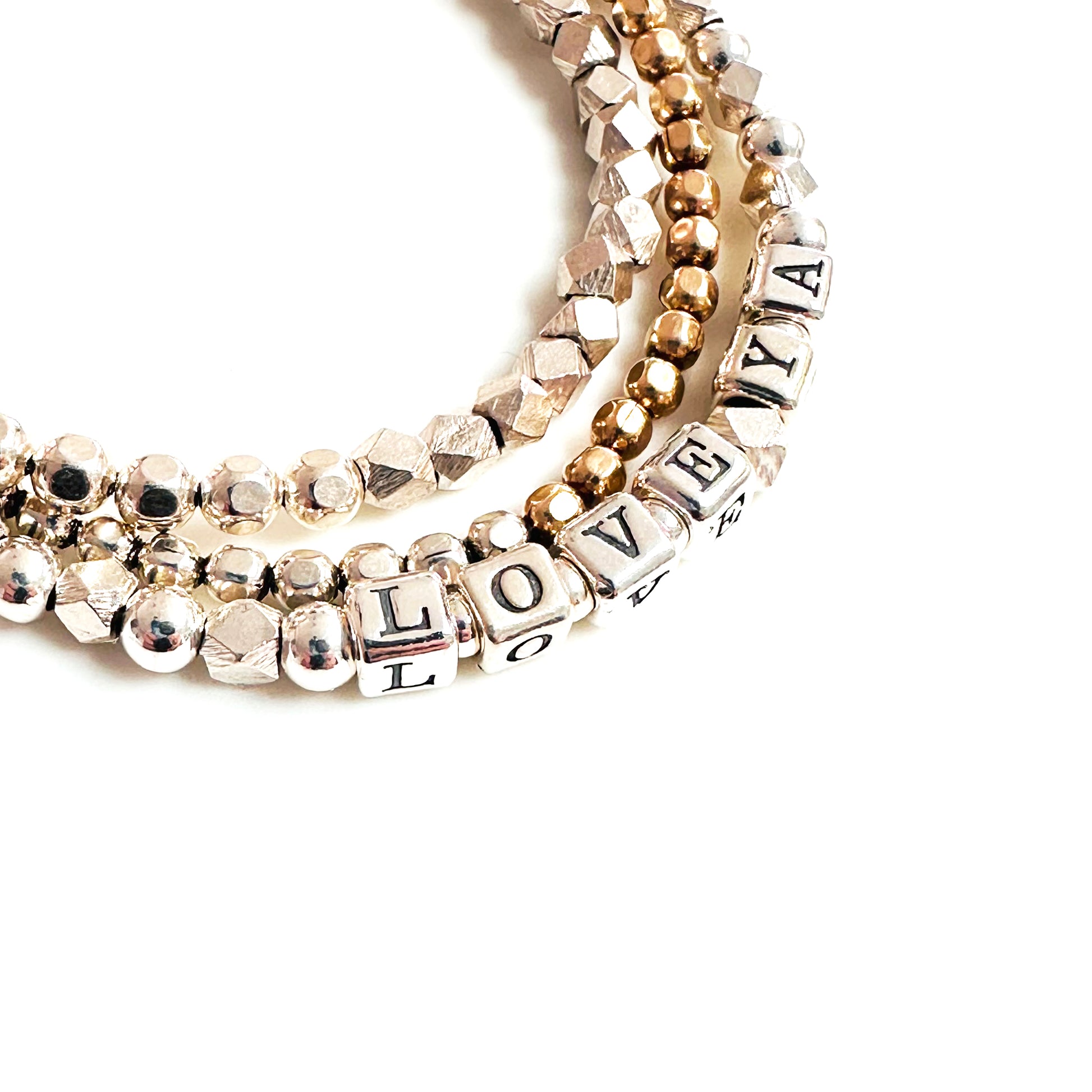 I Love You Valentine's bracelet in sterling silver shown with 14K gold