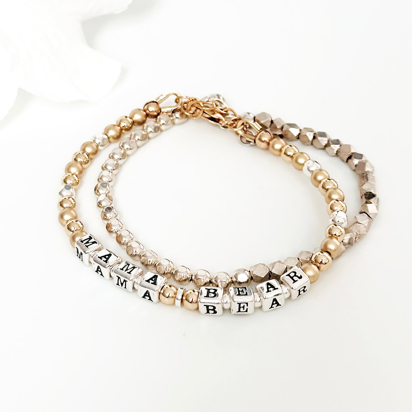 Mama Bear Sterling Silver and 14K Gold beaded bracelet with star charm shown with sterling silver beaded stacking bracelet