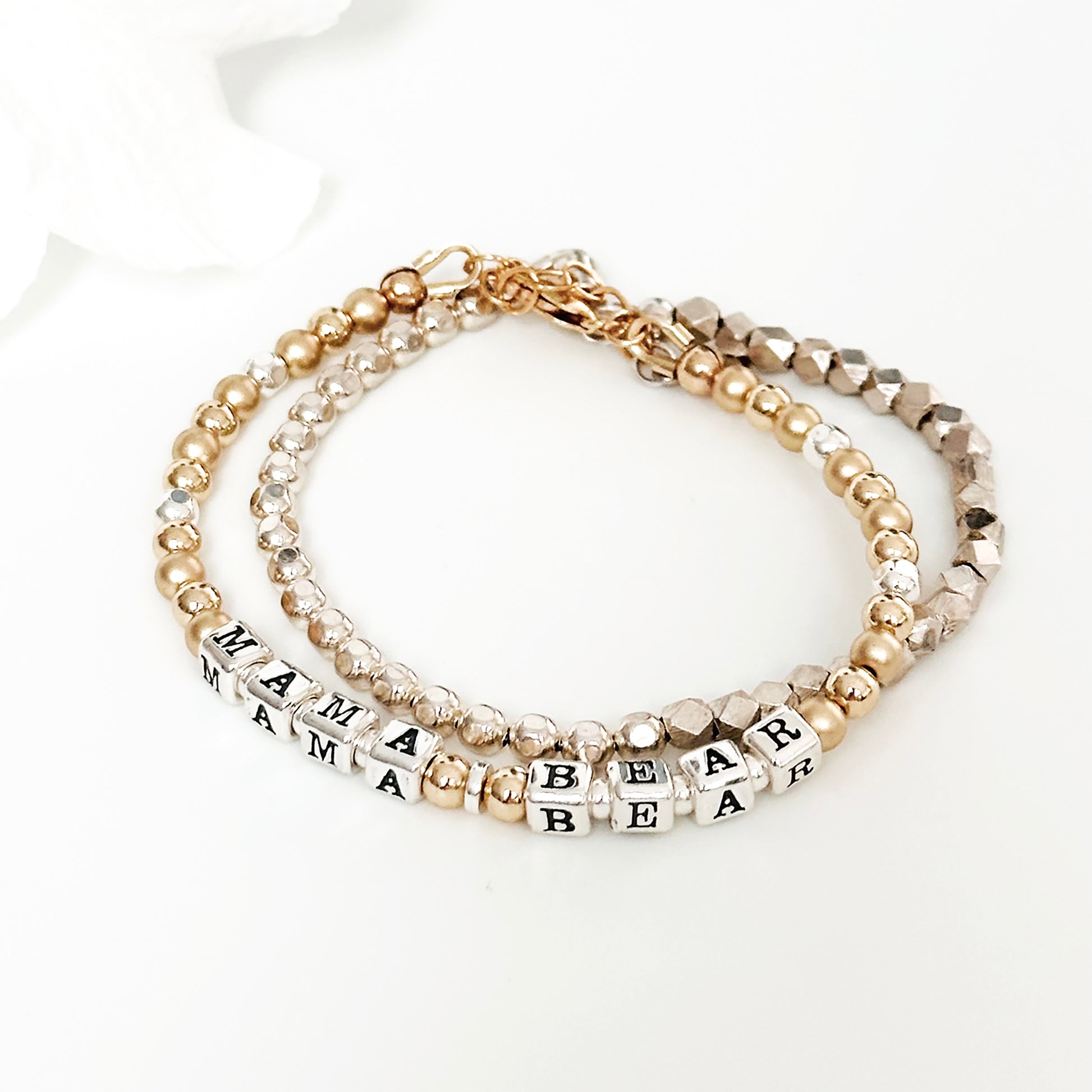 Mama Bear Sterling Silver and 14K Gold beaded bracelet with star charm shown with sterling silver beaded stacking bracelet