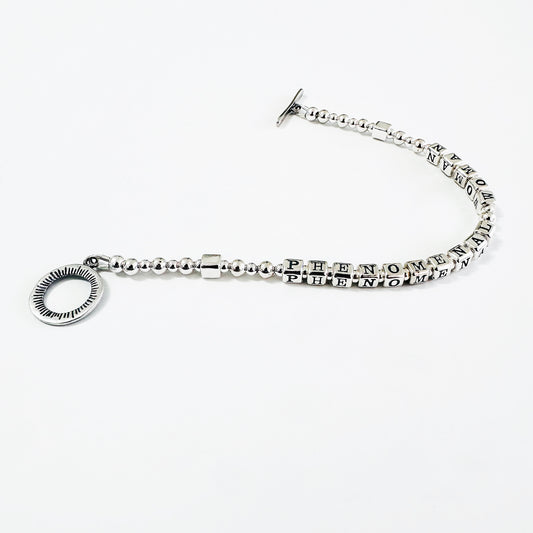 Phenomenal Woman by Maya Angelou sterling silver bracelet by Higher Calling Bracelets
