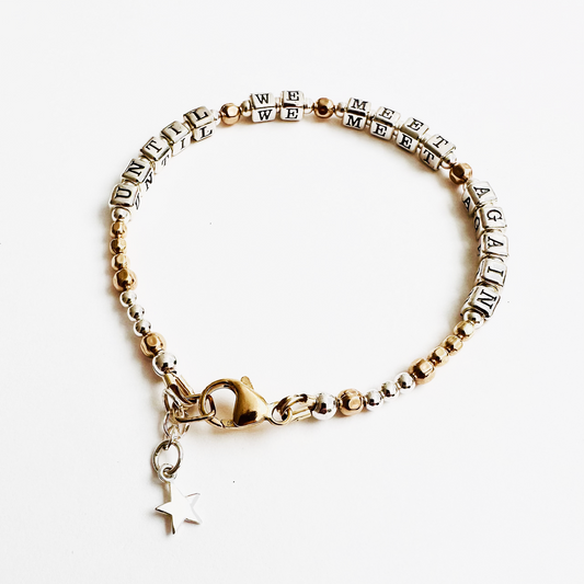 Sympathy, Grief, Going Away Gift Bracelet says "Until We Meet Again" in sterling silver and gold., with a sterling silver charm detail