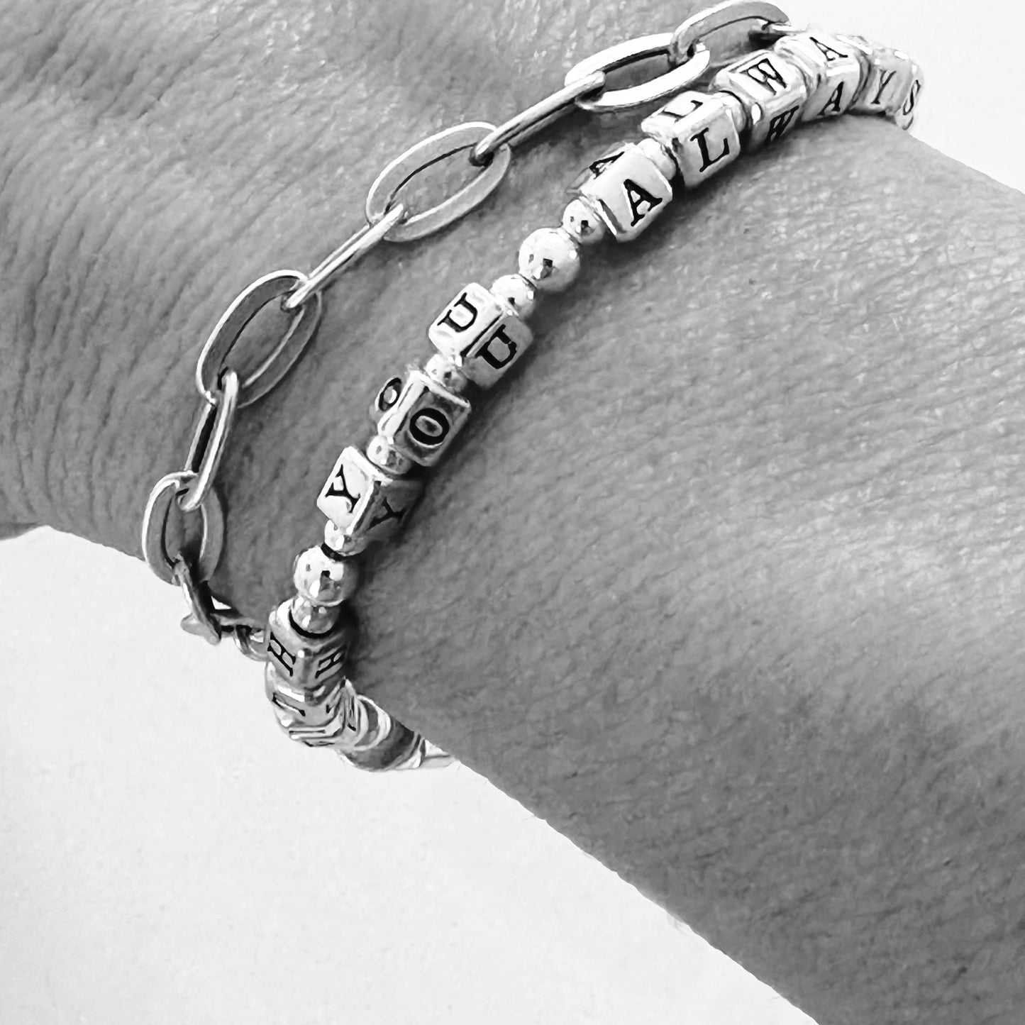 Sterling silver message bracelet with cross charm spells out bible verse Matthew 28:20, "With You Always"