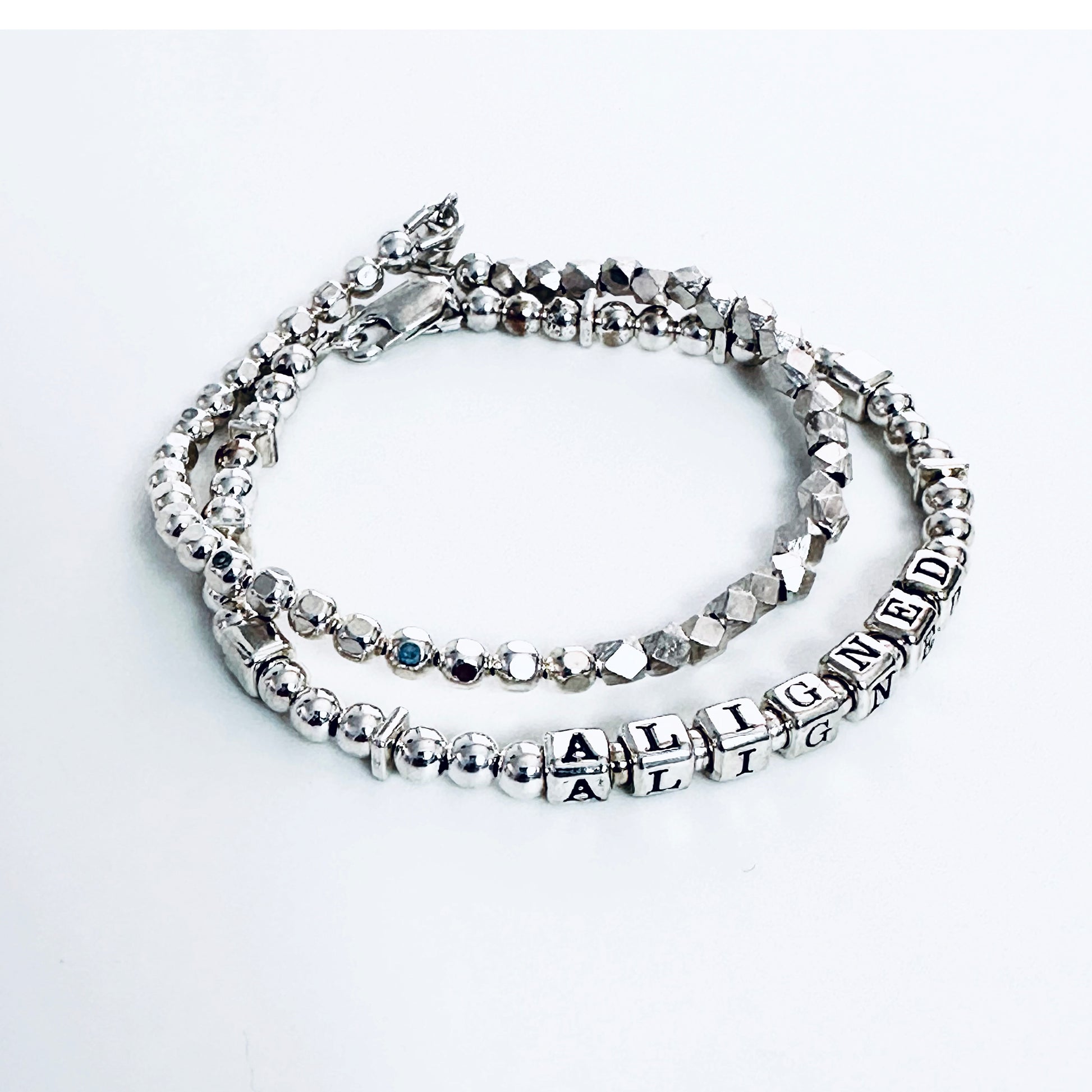 beaded sterling silver bracelet shown with Sterling silver Aligned bracelet