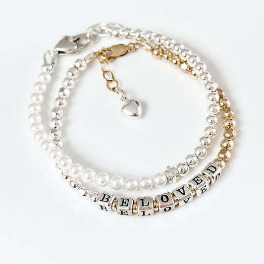 Beloved Mother's Day Bracelet in sterling silver and 14K gold beads, shown with pearl bracelet