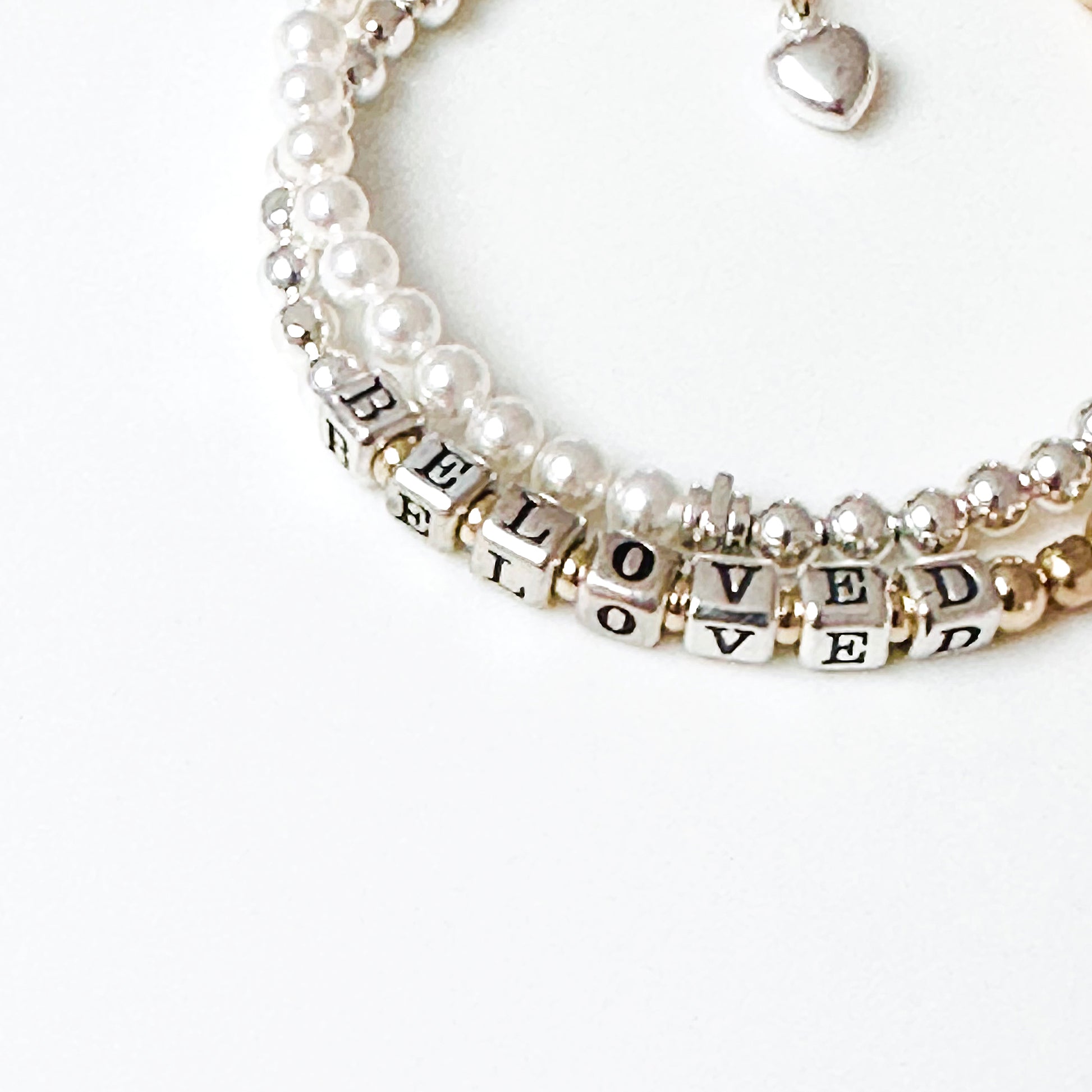Beloved Mother's Day Bracelet in sterling silver and 14K gold beads  with beaded stacking bracelets in sterling silver and 14k gold shown with pearl bracelet and sterling silver heart