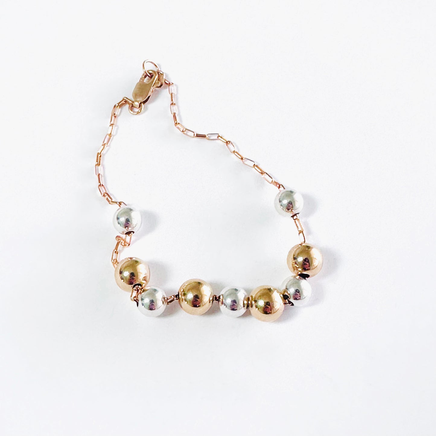 Delicate 14k gold-fill bracelet with sterling silver and gold balls