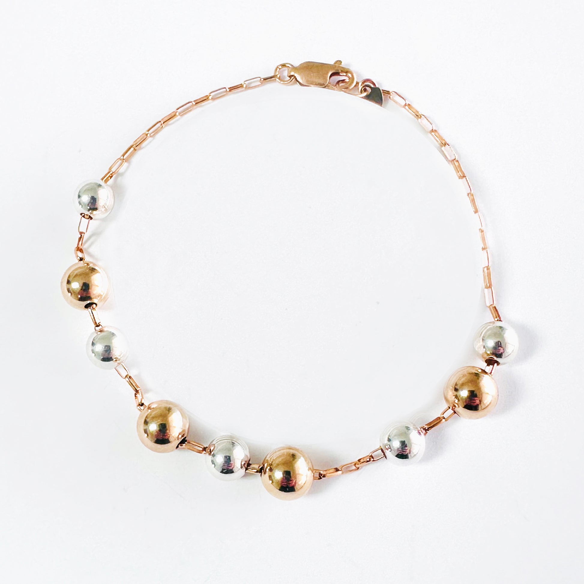 Delicate 14k gold-fill bracelet with sterling silver and gold balls