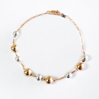 Delicate 14k gold-fill bracelet with sterling silver and gold balls