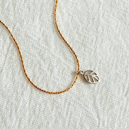 Delicate mixed metal nature leaf necklace in 14K and Sterling silver for nature lovers