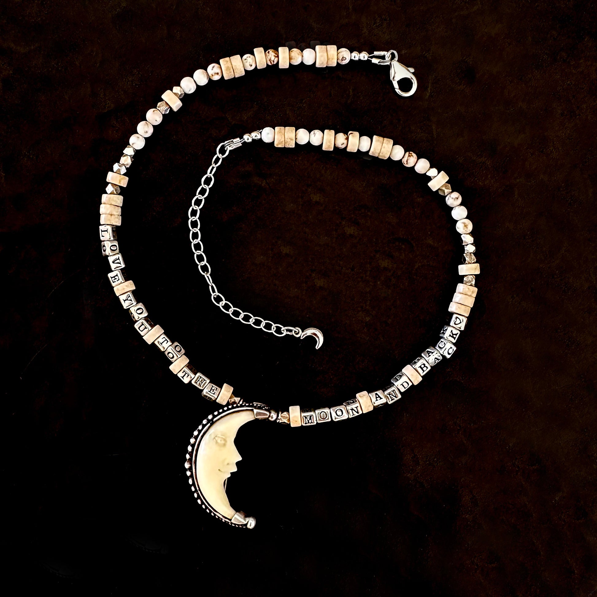 I Love You to the Moon and Back sterling silver necklace with vintage crescent moon in bone and sterling. One of a kind word necklace