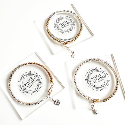 Special Occasion and Milestone affirmation and word gift bracelets shown in gift packaging from Higher Calling Bracelets