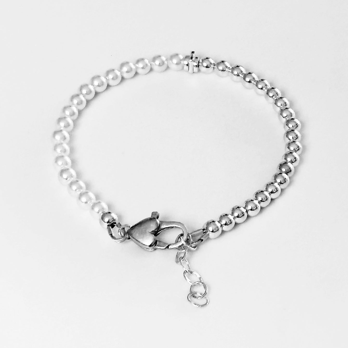 Pearl and Sterling Silver bracelet with heart clasp