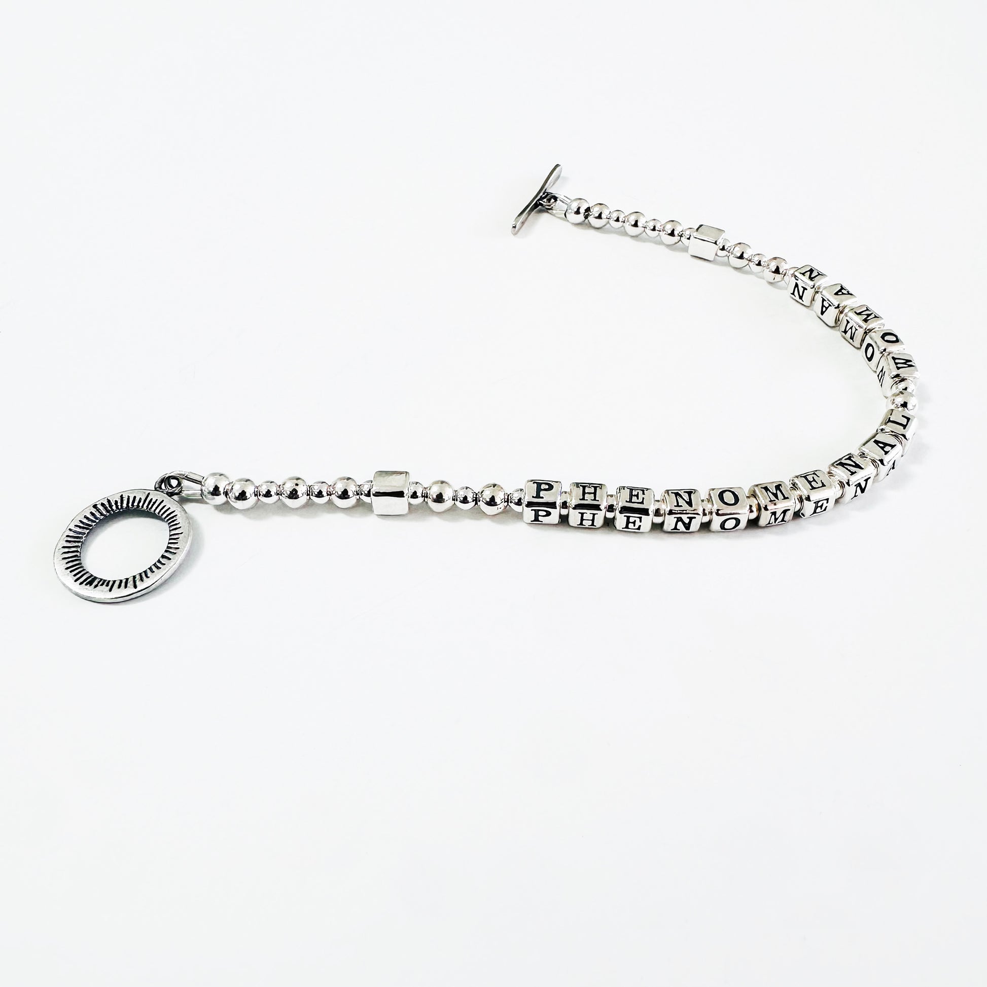 Phenomenal Woman by Maya Angelou sterling silver bracelet by Higher Calling Bracelets