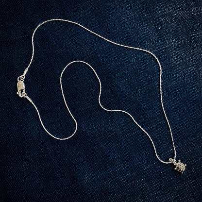 Delicate sterling silver tiny turtle necklace for patience, persistence