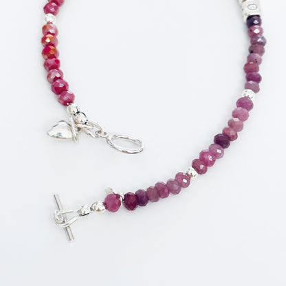 XOXO Hugs and Kisses Love and Friendship bracelet  in sterling silver and ruby gemstones